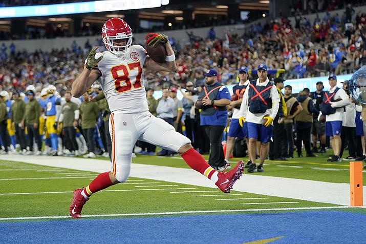 Kansas City Chiefs tight end Travis Kelce runs in for a touchdown during the first half of a game against the Los Angeles Chargers Sunday, Nov. 20, 2022, in Inglewood, Calif. (Jae C. Hong/AP)