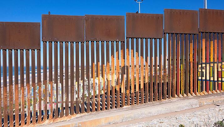 A coalition of conservative-leaning states, including Arizona, is making a last-ditch effort to keep in place a Trump-era public health rule that allows many asylum seekers to be turned away at the southern U.S. border. (Adobe image)