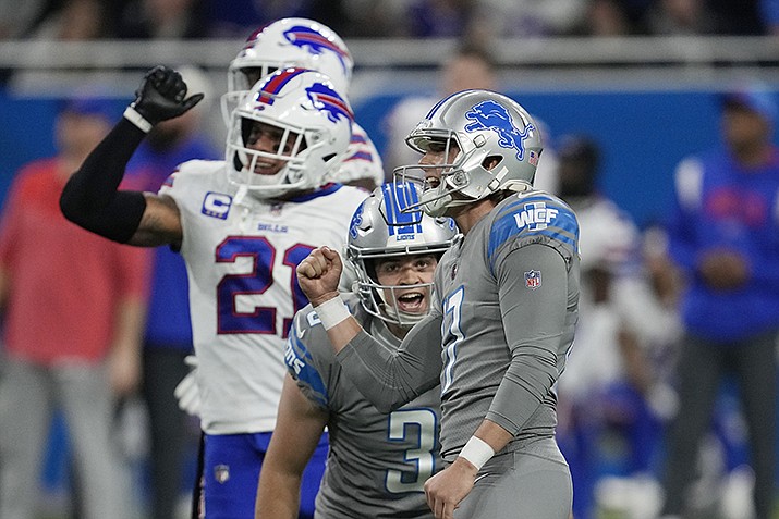 Detroit Lions punter Jack Fox (3) cheers as place kicker Michael Badgley ties the game during the second half of an NFL football game against the Buffalo Bills, Thursday, Nov. 24, 2022, in Detroit. (Paul Sancya/AP)