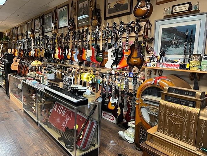One of the walls loaded with instruments inside the Blue Note music store. (Courtesy photo)