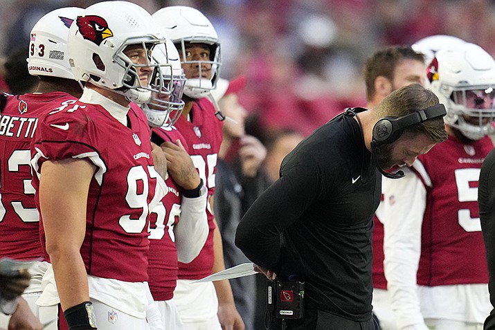 Arizona Cardinals head coach Kliff Kingsbury looks down during the second half of an NFL football game against the Los Angeles Chargers, Sunday, Nov. 27, 2022, in Glendale, Ariz. The Chargers defeated the Cardinals 25-24. (Ross D. Franklin/AP)