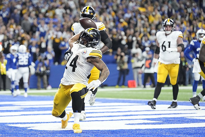 Pittsburgh Steelers running back Benny Snell Jr. (24) celebrates a touchdown run during the second half of an NFL football game against the Indianapolis Colts, Monday, Nov. 28, 2022, in Indianapolis. (AJ Mast/AP)