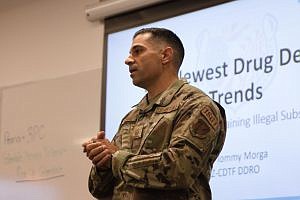 National Guard Sgt. Tommy Morga educates parents about how drugs like fentanyl are sold through social media apps such as Snapchat. Although drug dealers operate through many social media platforms, experts are most worried about Snapchat due to the app’s anonymity, disappearing messages and lack of third-party monitoring. (Laura Bargfeld/Cronkite News)