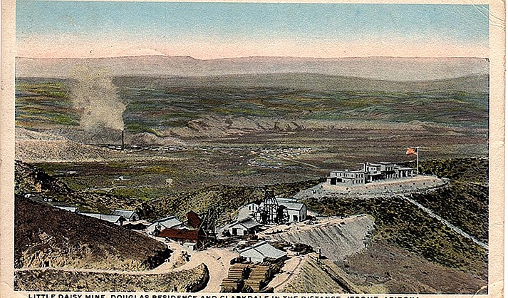The workings of the United Verde Extension Mining Company mine and the Douglas home overlook the valley with Clarkdale and the United Verde Copper Company smelter. The single 400-foot smokestack began flooding the area with sulfur-laden fumes during May of 1915.