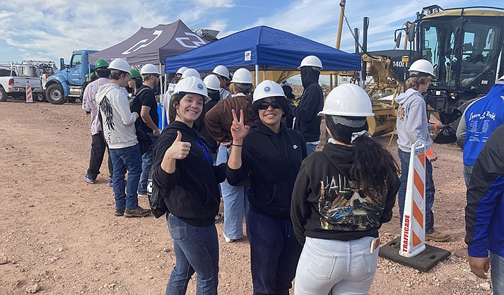 JAG students on a construction field trip, testing out different equipment and machinery.