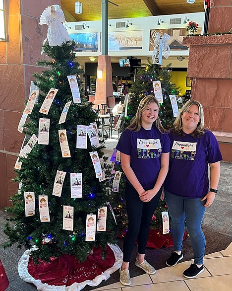 Sparklight associate Kim Anderson, right, and her daughter Kirra recently used her “Angel Day,” a paid company volunteer day, to volunteer at Prescott Gateway Mall in support of the local Salvation Army’s Christmas Angel Tree Program.(Phil Levine/Courtesy)