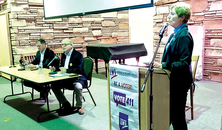 Moderator Robin Low of the League of Women Voters and Josh Tinkle of NAH look on while Kent Ellsworth (center) of Verde Valley Caregivers Coalition answers an audience question. (Cindy Cole/courtesy)