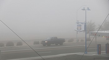 Unusual low ground fog blankets Kingman Area photo