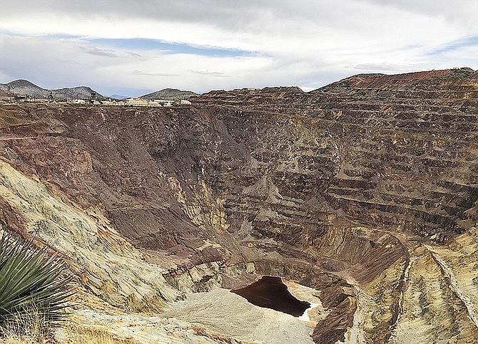 A May 12, 2019 photo, shows what’s left of the Lavender pit mine outside Bisbee, Arizona, where the copper operation stopped in 1974. Forty-five years later, the pit remains a scar on the landscape, the layering made from potentially toxic mine tailings. (Anita Snow/Associated Press)