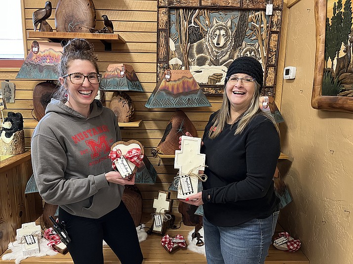 Kayla Besler (left) and Linda Lopez from Colors of the West Gift Shop show off some American made goods, perfect for holiday gifting. (Summer Serino/WGCN)
