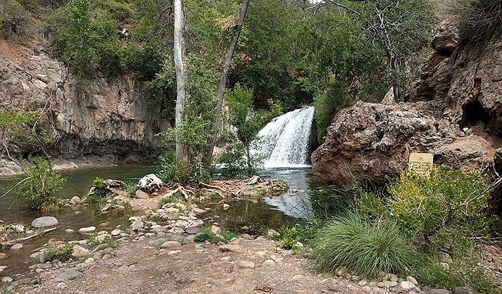Fossil Creek’s iconic waterfall, seen with healthy vegetation, seems untouched, but water levels are low. (Courtesy of Coconino National Forest)