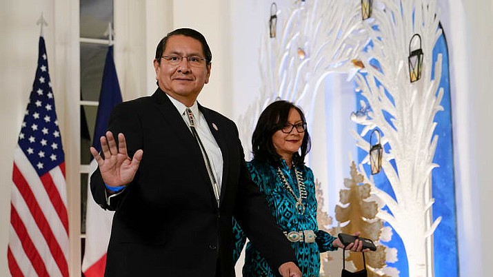 Navajo Nation President Jonathan Nez and his wife Phefelia Nez arrive for the State Dinner Dec. 1. (AP Photo/Susan Walsh)