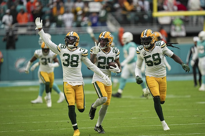 NFL Roundup: Packers intercept 3 passes in 4th, beat Tua, Dolphins 26-20, The Daily Courier