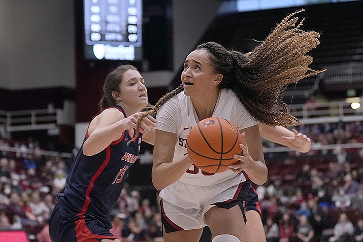 Stanford guard Haley Jones, right, looks to shoot against Arizona guard Helena Pueyo (13) during the second half of an NCAA college basketball game Monday, Jan. 2, 2023, in Stanford, Calif. (Tony Avelar/AP)
