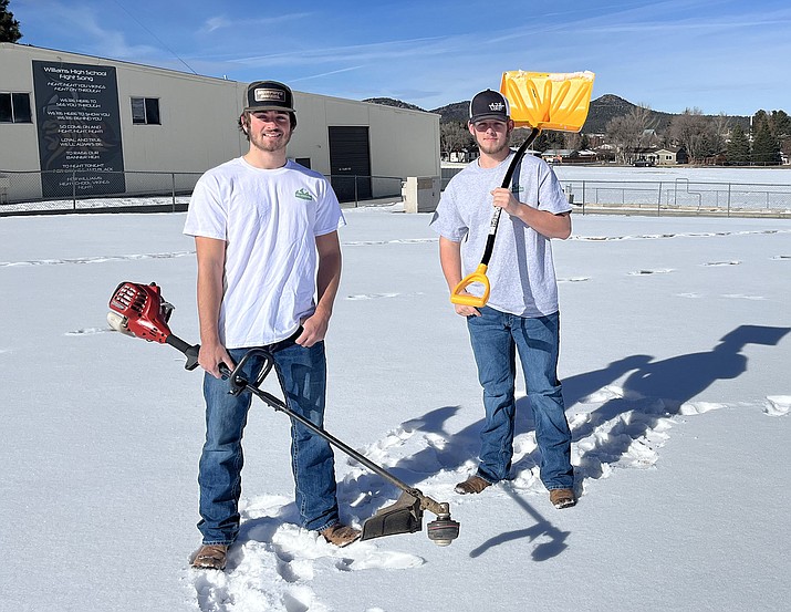 Drew Logan (left) and Danny Siegfried are seniors at Williams High School and run the business, DDD Landscaping. (Summer Serino/WGCN)