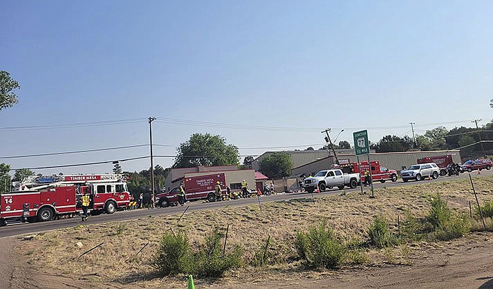 In this June 19, 2021, file photo, released by the Timber Mesa Fire and Medical District, emergency personnel gather at the scene of a mass casualty incident near Downtown 9 in Show Low. (Timber Mesa Fire and Medical District via AP, File)