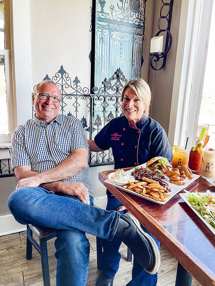 Eric and Chef Michelle Jurisin take a brief rest among their nine Verde Valley businesses. It was 20 years ago that Nic’s Italian Steak & Crab House opened in Cottonwood and boosted the revival of Old Town. (Contributed photo)