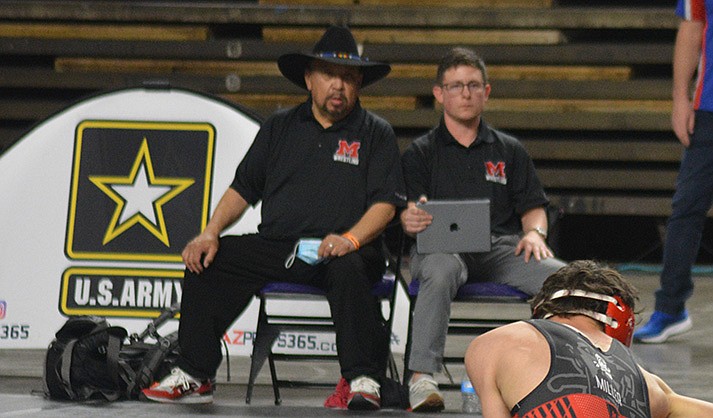 Wrestling coach, homeless community team up to honor former