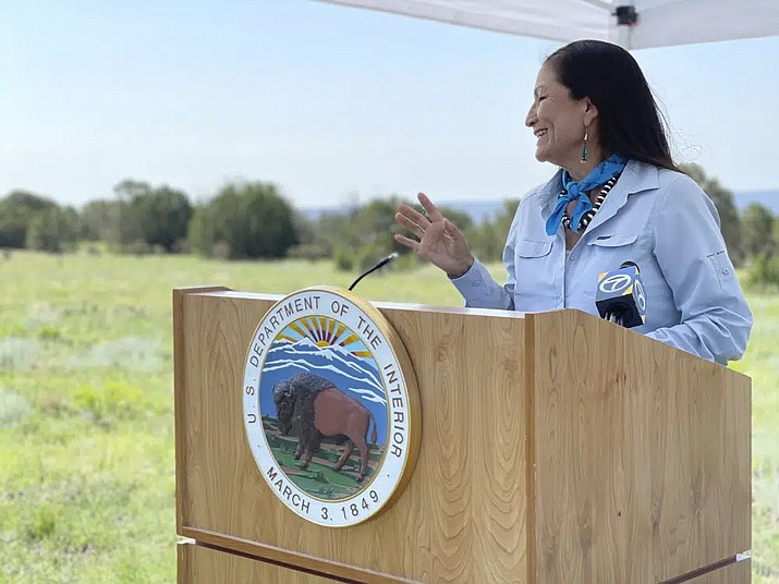U.S. Interior Secretary Deb Haaland speaks at the Sabinoso Wilderness in Las Vegas, N.M., July 17, 2021. The U.S. Department of the Interior renamed five places in four states that had featured a racist term for a Native American woman until Thursday, Jan. 12, 2023. (Felicia A. Salazar/U.S. Department of the Interior via AP, File)
