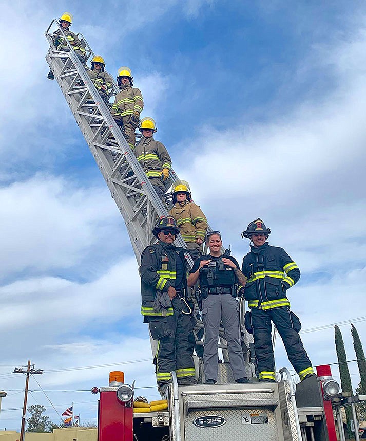 VACTE Fire Science students pose on ladder-training day on Tuesday, Jan. 10, 2023, at Camp Verde High School with their Copper Canyon Fire District instructors. (Copper Canyon Fire & Medical District photo)
