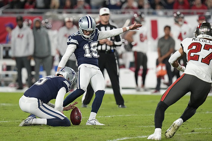 Dallas Cowboys place kicker Brett Maher (19) against the Tampa Bay Buccaneers during an NFL wild card playoff football game Monday, Jan. 16, 2023, in Tampa, Fla. Maher made dubious NFL history by missing his first four extra-point attempts. (Chris O'Meara/AP)