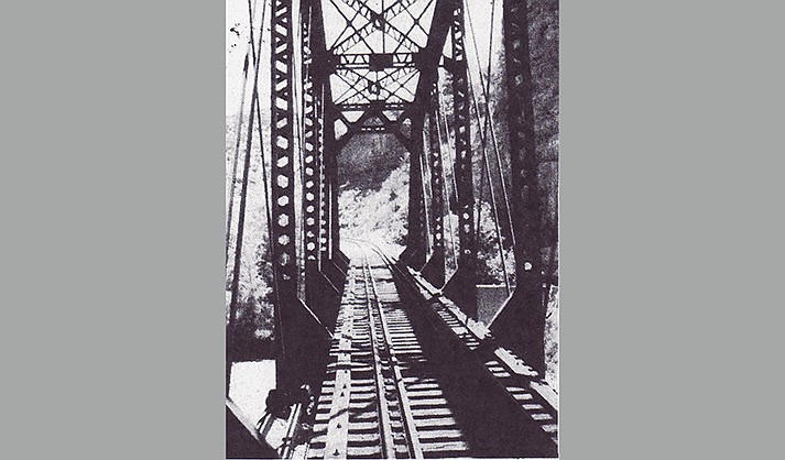 Verde Valley Railway crossed the Verde River on a steel bridge east of Perkinsville. (Verde River Canyon Excursion Train, Autumn 1993.)