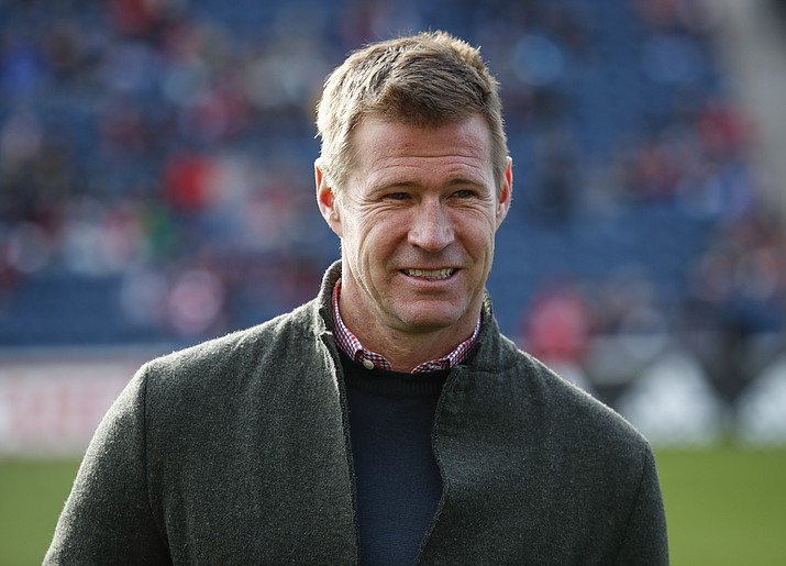 Brian McBride waits for an MLS match between the Chicago Fire and Portland Timbers, March 31, 2018, in Bridgeview, Ill. McBride is out as general manager of the U.S. men’s national team, U.S. Soccer Federation sporting director Earnie Stewart told the governing body’s board of directors. (Kamil Krzaczynski/AP, File)