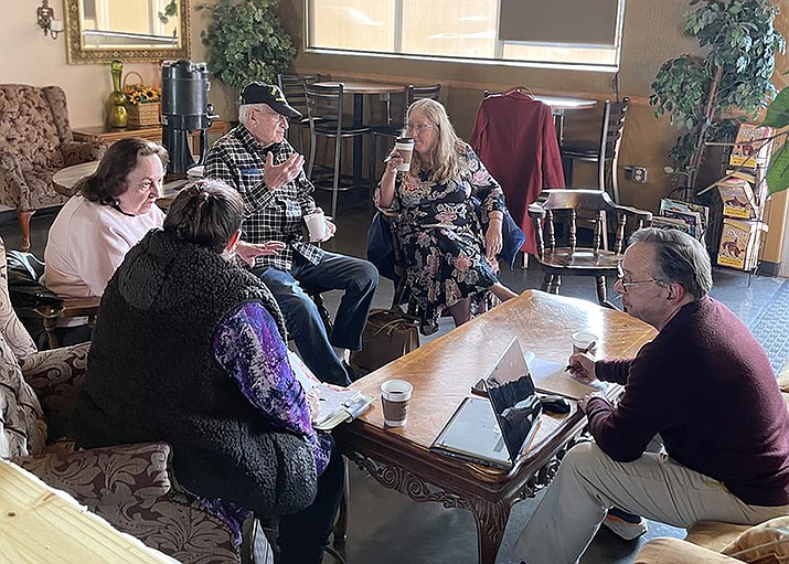 HUSD Governing Board president Rich Adler, right, visits with first-comers to his “Coffee & Chat” event Thursday, January 19, 2023. (Shea Johnson, HUSD/Courtesy))