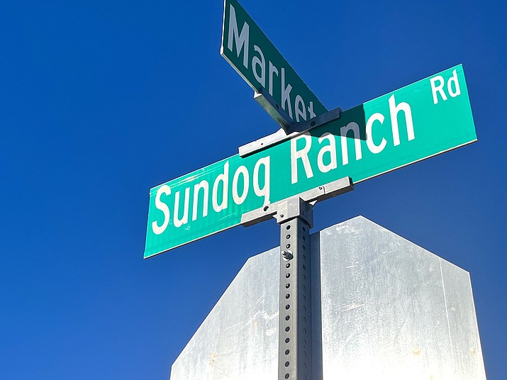 A street sign for Sundog Ranch Road stands at its intersection with Market Street in Prescott Valley near the Hobby Lobby. (Aaron Valdez/Courier)