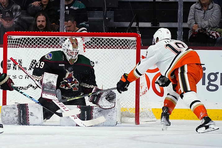 Arizona Coyotes goaltender Connor Ingram (39) makes a save on a shot by Anaheim Ducks right wing Troy Terry (19) during the first period of an NHL hockey game in Tempe, Ariz., Tuesday, Jan. 24, 2023. (Ross D. Franklin/AP)