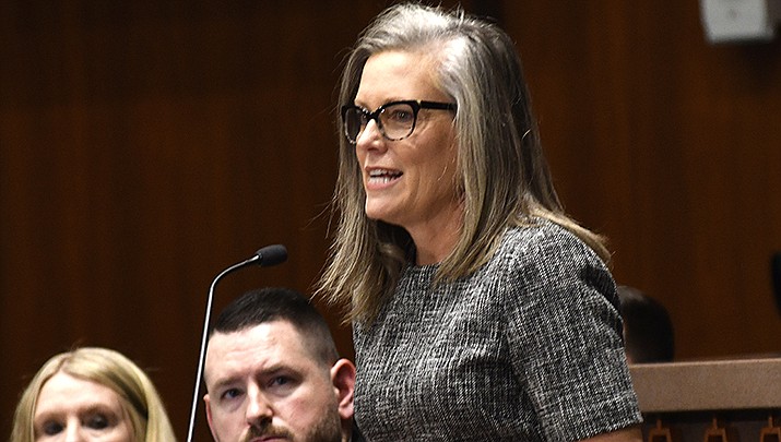 Democratic Arizona Gov. Katie Hobbs is defending her decision to continue her Republican predecessor’s program to transport migrants out of border communities. (File photo by Howard Fischer/For the Miner)