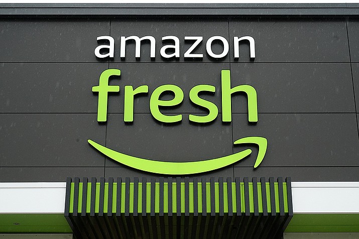 An Amazon Fresh grocery store stands in Warrington, Pa., on Feb. 4, 2022. In an email to Prime members Friday, Jan. 27, 2023, Amazon said that they are axing free grocery delivery for Prime members on orders less than $150. (Matt Rourke, AP File)