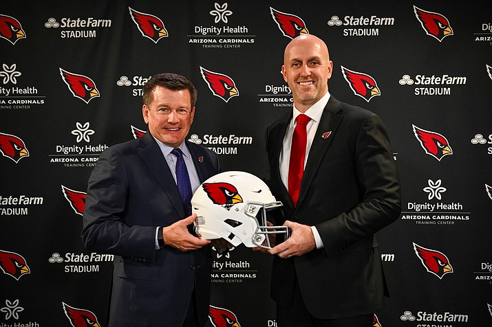 Arizona Cardinals owner Michael Bidwill, left, stands with new Cardinals general manager Monti Ossenfort, right, during a press conference to announce his hiring on Tuesday, Jan. 17, 2023.