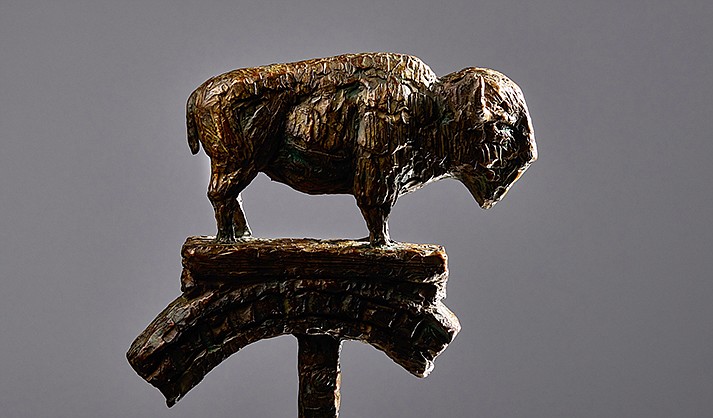 Buffalo on Circle of Life by Mark Edward Adams. Bronze ed. 35, 13”H x 10.5”W x 4.75”D