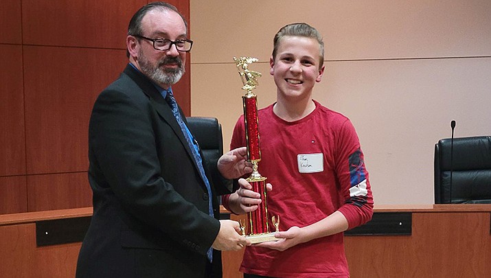 Mohave County Spelling Bee champ Ethan Knudson of Colorado City is pictured with competition pronouncer Cliff Angle. (Courtesy photo)