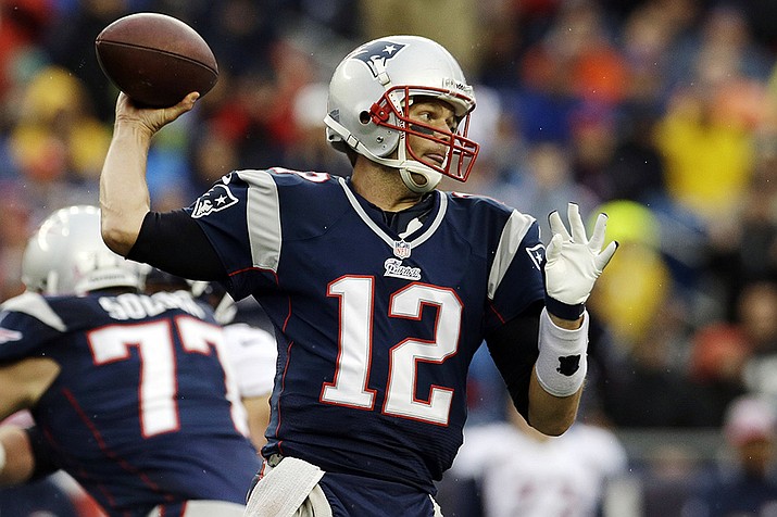 New England Patriots quarterback Tom Brady (12) passes against the Denver Broncos in the first quarter of an NFL football game on Oct. 7, 2012, in Foxborough, Mass. Brady, the seven-time Super Bowl winner with New England and Tampa Bay, announced his retirement from the NFL on Wednesday, Feb. 1, 2023 exactly one year after first saying his playing days were over. He leaves the NFL with more wins, yards passing and touchdowns than any other quarterback. (Elise Amendola, File)