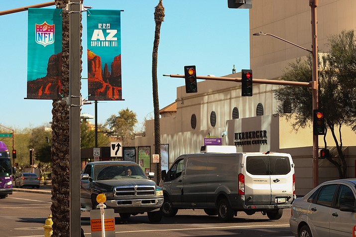 Signs announcing the Super Bowl can be seen all through downtown Phoenix, but the city had limited signs near game-associated entertainment areas – so-called “clean zones.” A court ruled Thursday that the law was an unconstitutional infringement on free speech rights. (Logan Camden/Cronkite News)