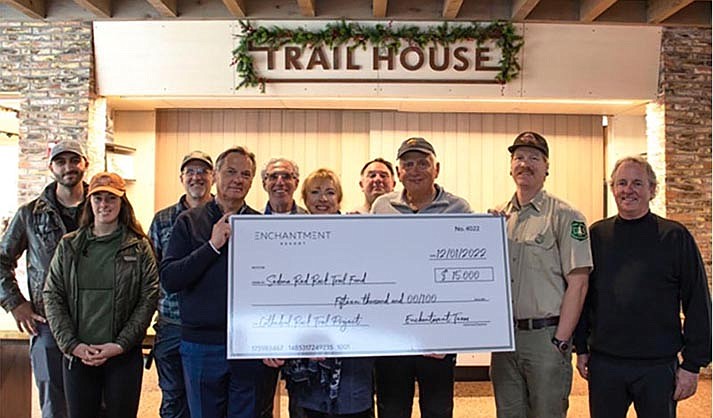 With the boost of a $15,000 donation from Enchantment Resort, the gap on the Upper Cathedral restoration has closed to $69,760. Pictured: Enchantment’s Managing Director Stan Kantowski, Trail House staff, representatives from USFS and the Sedona Red Rock Trail Fund.
