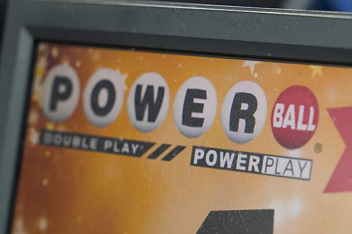 A display panel advertises tickets for a Powerball drawing at a convenience store, Nov. 7, 2022, in Renfrew, Pa. A $747 million Powerball jackpot will be up for grabs for players willing to risk $2 against the long odds of winning the big prize. No one has won the jackpot since November. That has allowed the prize to grow larger with each of the game’s three weekly drawings. It stands as the ninth-largest in U.S. history ahead of a drawing Monday, Feb. 6, 2023. (Keith Srakocic/AP, file)