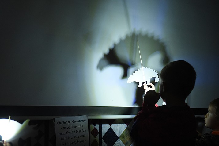 Children explore the science of Light and Shadow at the Leap into Science workshop at Chino Valley Public Library, on Wednesday, Feb. 1, 2023. (Jesse Bertel/Review)