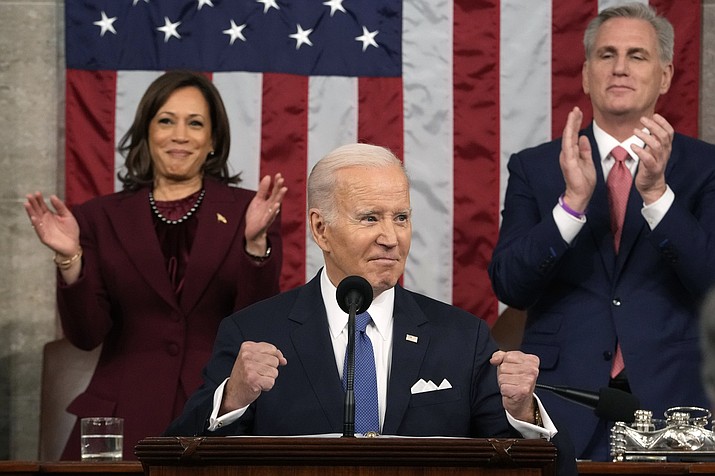 President Joe Biden delivers the State of the Union address to a joint session of Congress at the U.S. Capitol, Tuesday, Feb. 7, 2023, in Washington, as Vice President Kamala Harris and House Speaker Kevin McCarthy of Calif., applaud. (Jacquelyn Martin/AP, Pool)