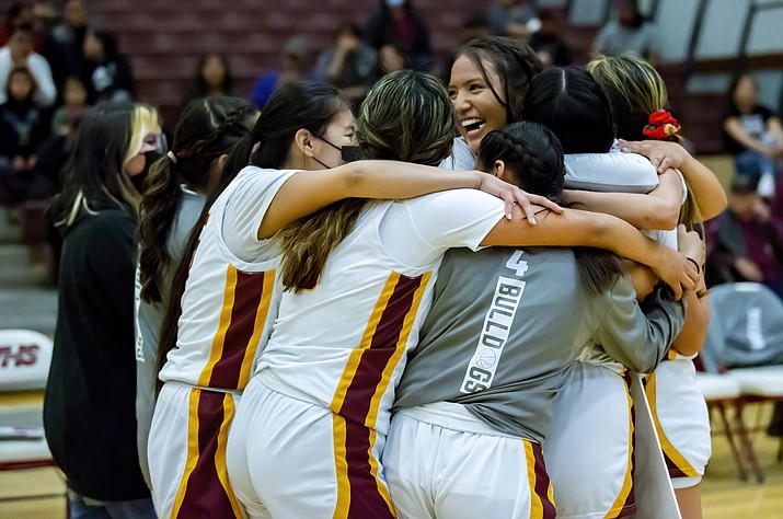 The Lady Bulldogs celebrate Jaci Gonnie's 1000th point at the Winslow-Show Low game Feb. 11. (Photos/El Big Guy)