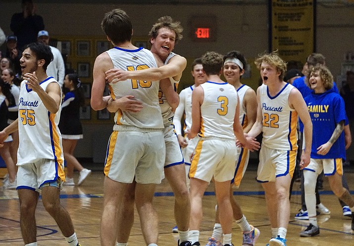 Prescott boys basketball celebrates after defeating Salpointe Catholic 61-54 during the first round of the 4A state playoffs on Thursday, Feb. 16, 2023, in Prescott’s Dome gym. (Aaron Valdez/Courier)