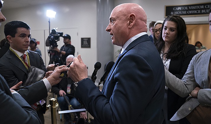 Sen. Mark Kelly, D-Ariz., speaks with reporters following a classified briefing on China, at the Capitol in Washington, Feb. 15, 2023. Senators are investigating how the suspected Chinese surveillance balloon was allowed to pass over crucial missile sites. Kelly is a former astronaut. He wants to require weather balloons to carry a radar transponder. (AP Photo/J. Scott Applewhite, File)