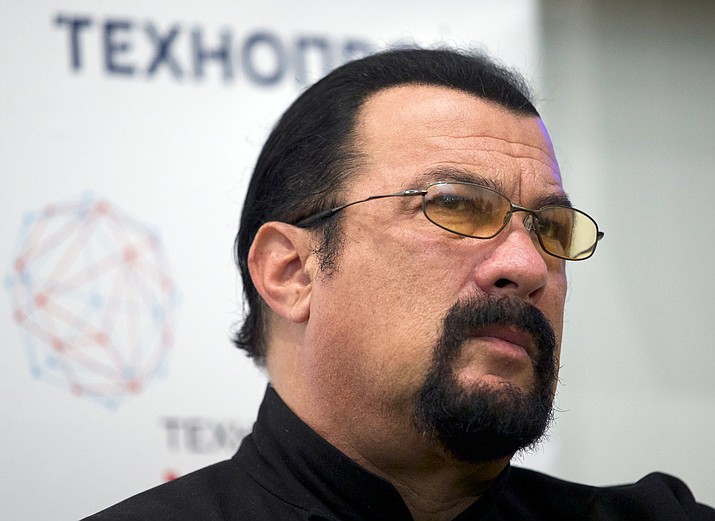 Steven Seagal speaks at a news conference while attending an opening ceremony for a research and development center in Moscow, Russia, Sept. 22, 2015. Russian President Vladimir Putin on Monday Feb. 27, 2023, bestowed a state decoration on Steven Seagal, the American action-movie actor who also holds Russian citizenship. (Ivan Sekretarev/AP, File)