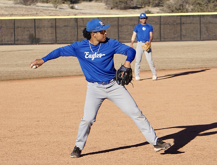 Embry-Riddle infielder Roberto Garza-Nunez throws a ball to first base during a team practice on Wednesday, Feb. 8, 2023, at the Embry-Riddle baseball field in Prescott. (Aaron Valdez/Courier)