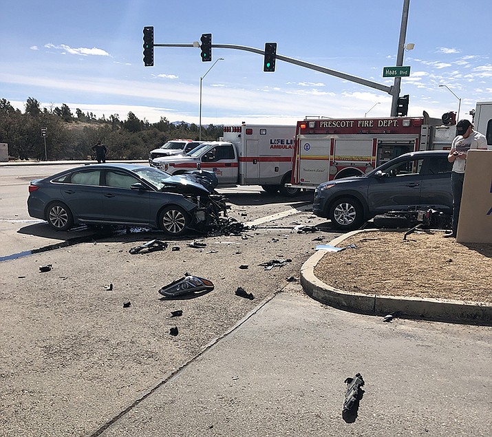 Prescott Police and rescue personnel work the scene of a collision, at Willow Creek Road and Haas Boulevard on Monday, March 6, 2023, that ultimately took the life of a motorcyclist. (PPD/Courtesy photo)