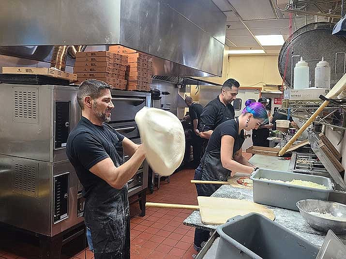 Leon and Partner Chef Juve tossing pies. (Barry Barbe/Courtesy)