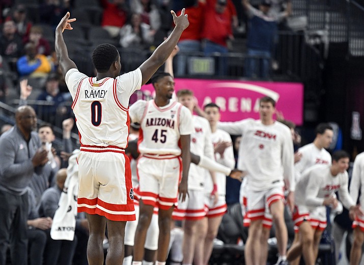 Arizona guard Courtney Ramey (0) reacts after a 3-point basket against Stanford during the second half of a game in the quarterfinals of the Pac-12 men's tournament Thursday, March 9, 2023, in Las Vegas. (David Becker/AP)