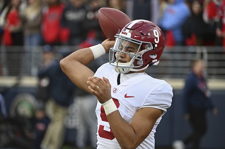 Alabama quarterback Bryce Young (9) warms up on the sidelines during the first half of a game against Mississippi in Oxford, Miss., Saturday, Nov. 12, 2022. (Thomas Graning/AP, File)